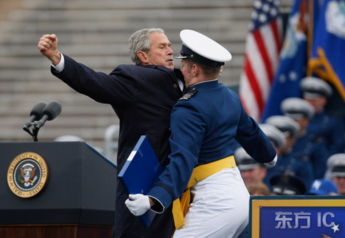 Bush plays chest-bumping with Air Force cadet